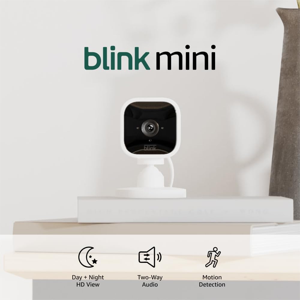 Showcases the Blink Mini security camera's small size and sleek design, emphasizing its compact nature for easy placement in the home.