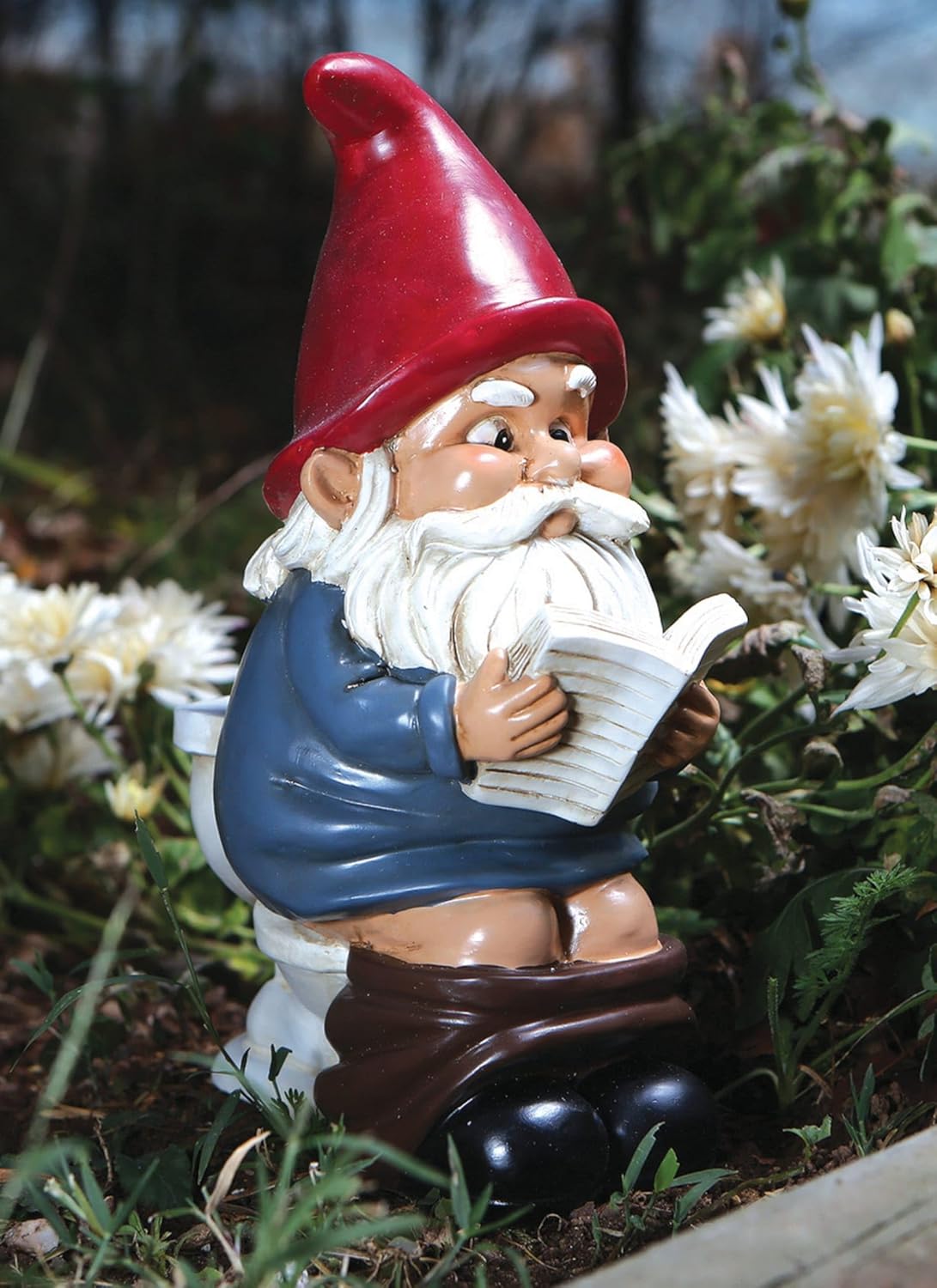 Shows the product in a natural garden setting to demonstrate its use as outdoor decoration.