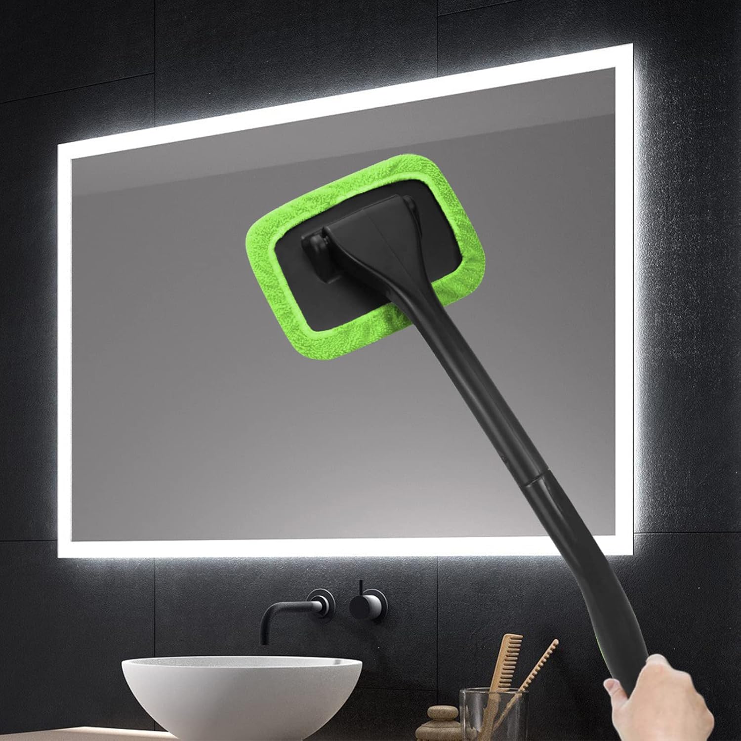 Highlights the product's microfiber cleaning pad for effective mirror and glass cleaning.
