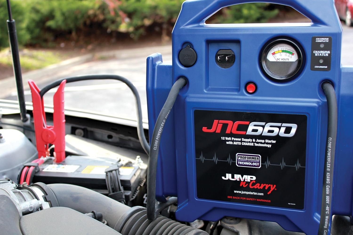 Highlights the key components and features of the JNC660 jump starter, showing its functionality as both a power supply and jump starter.