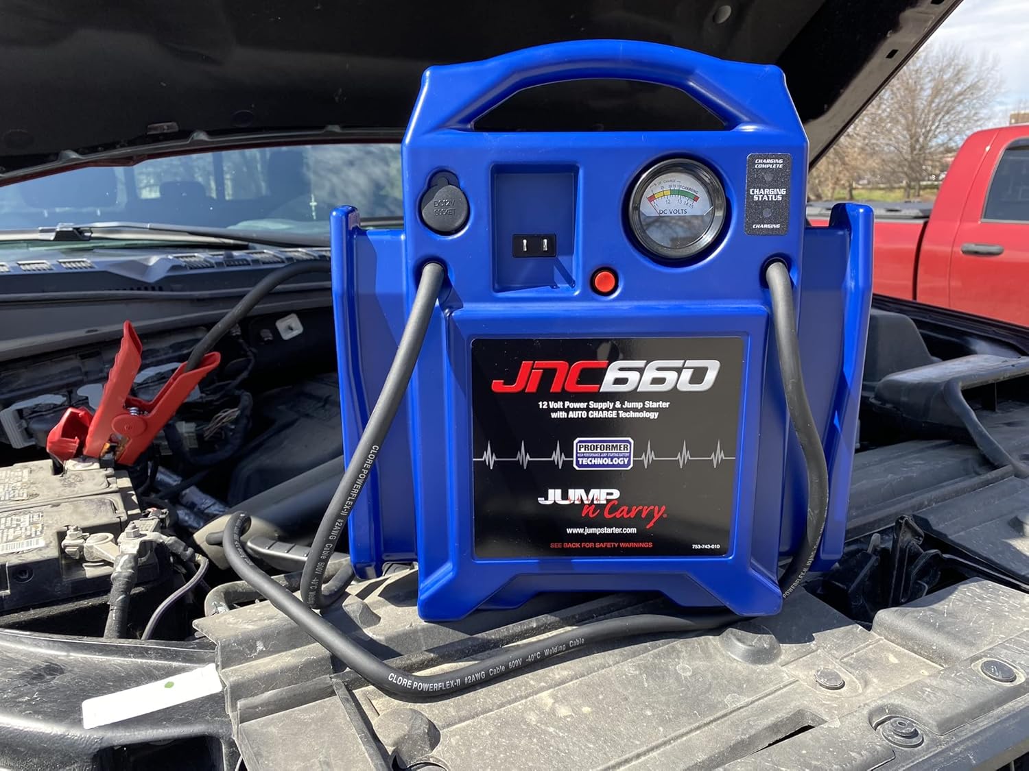 Demonstrates the product's use as a portable jump starter and power supply for vehicles, highlighting its versatility in automotive emergencies.