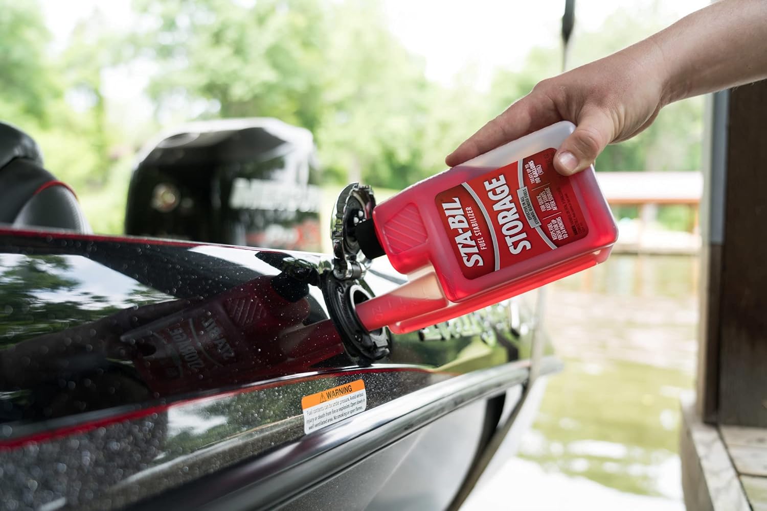 Demonstrates the practical application of the fuel stabilizer in a real-world boating scenario, showing how easy it is to use.