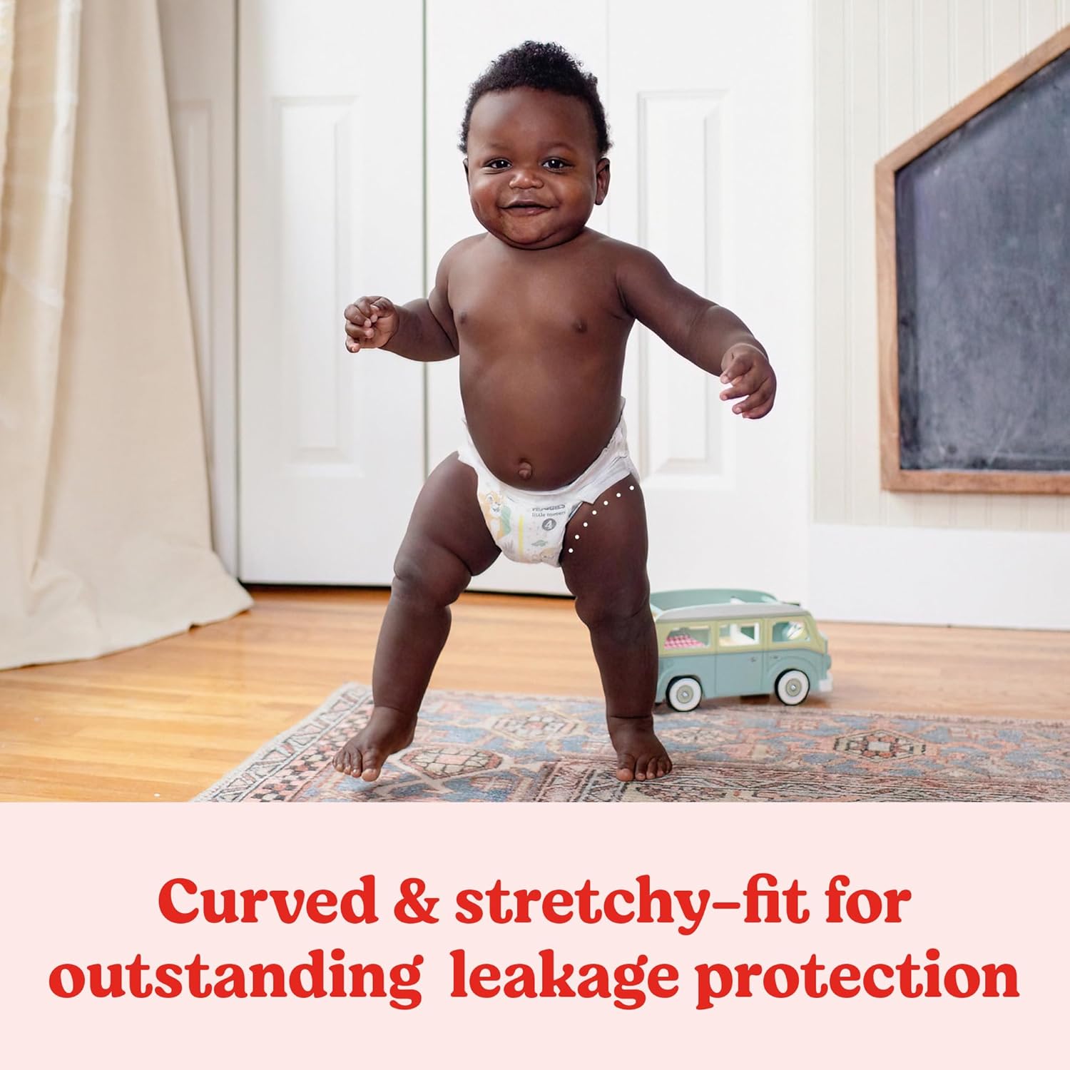 Highlights the diaper's curved and stretchy fit to provide excellent leakage protection for active babies.