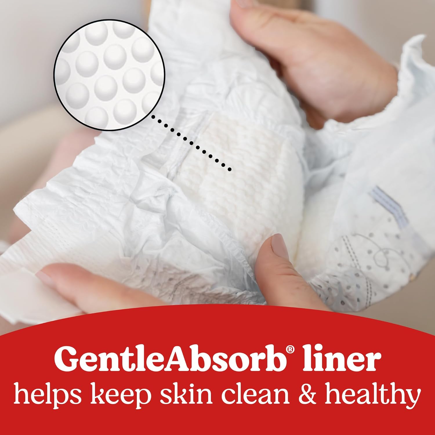 Highlights the diaper's GentleAbsorb liner feature, emphasizing its ability to keep baby's skin clean and healthy.