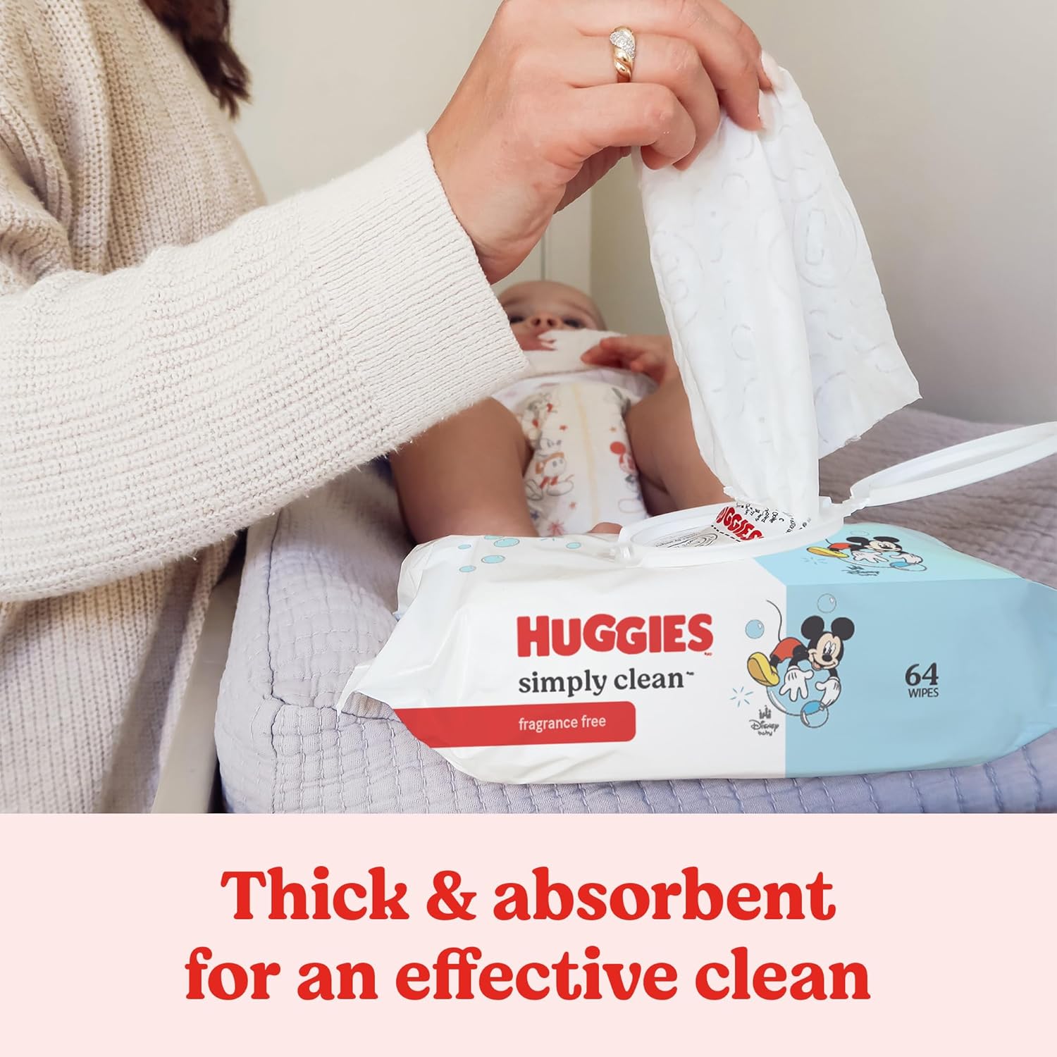 Highlights the wipes' effectiveness in cleaning, emphasizing their thickness and absorbency for thorough cleaning of babies.