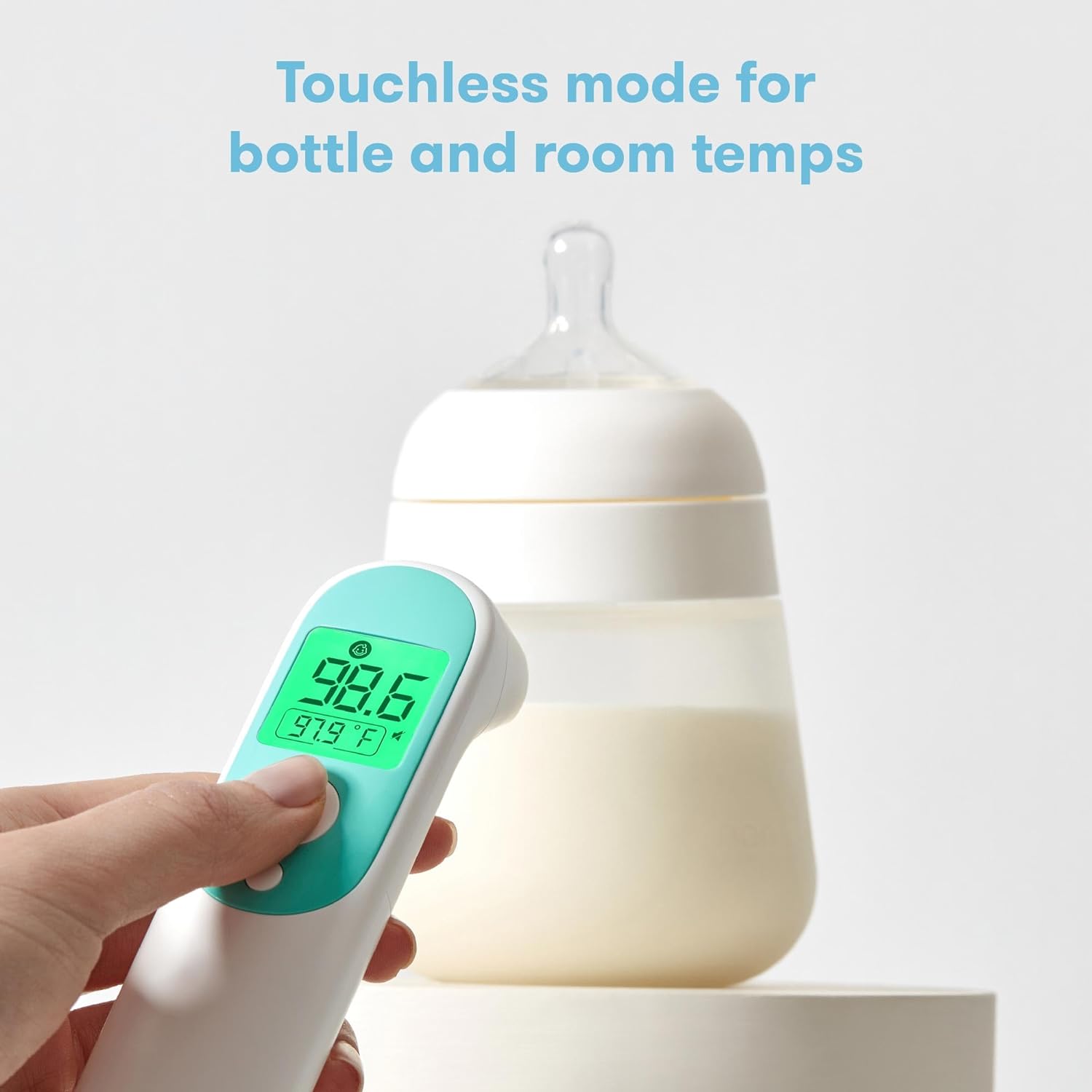 Highlights the product's touchless temperature reading capability for both bottle and room temperatures, emphasizing convenience and hygiene.
