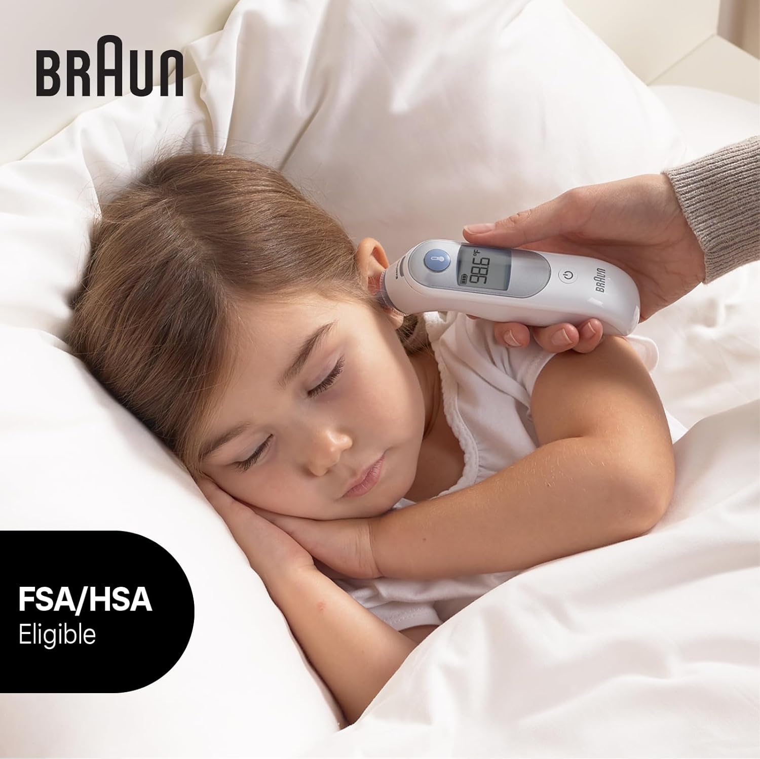 Demonstrates the ease and comfort of using the Braun thermometer to measure a child's temperature while they sleep.