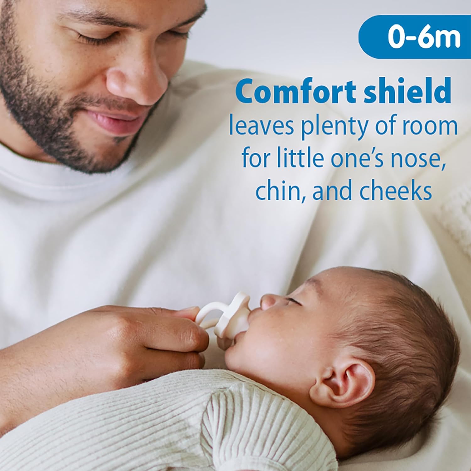 Highlights the pacifier's comfort shield feature that provides ample space for the baby's face, ensuring a comfortable fit.