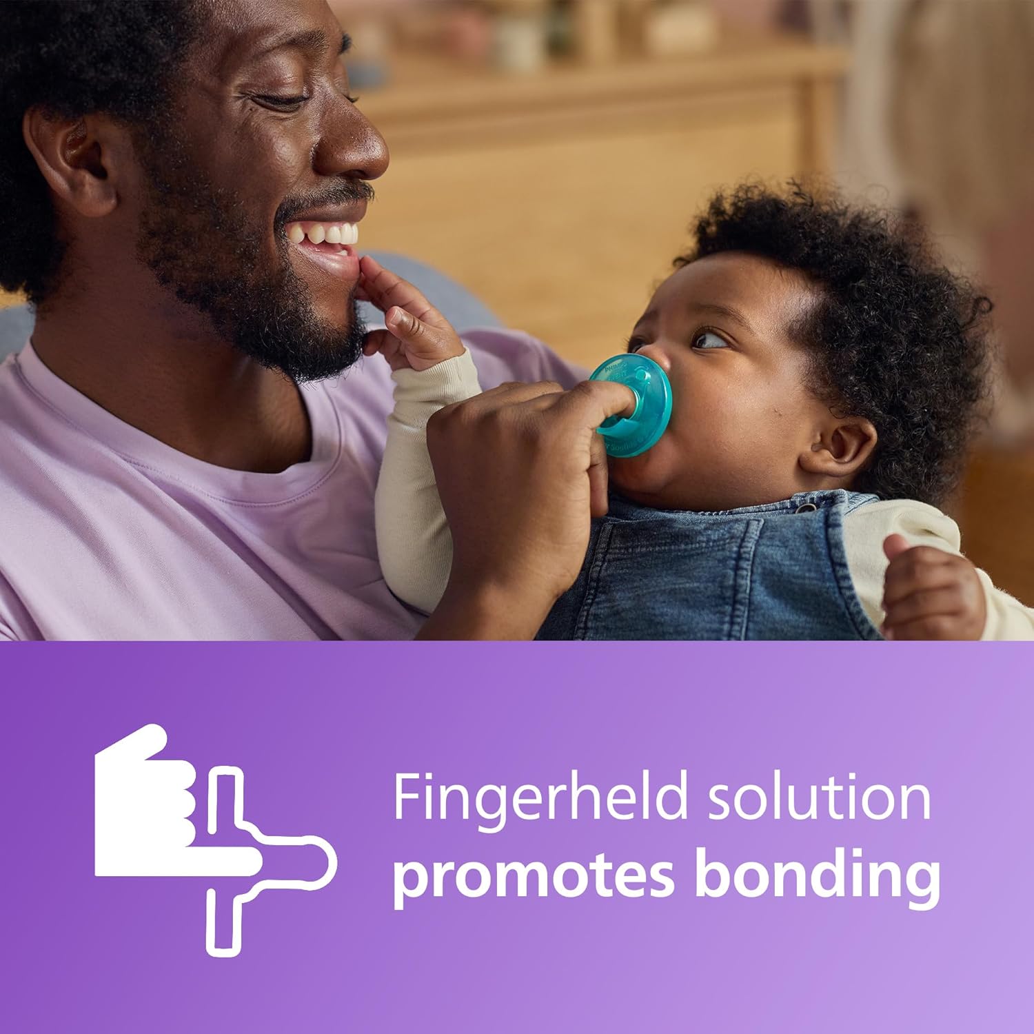 Highlights how the product's fingerheld design promotes bonding between parent and child during feeding.