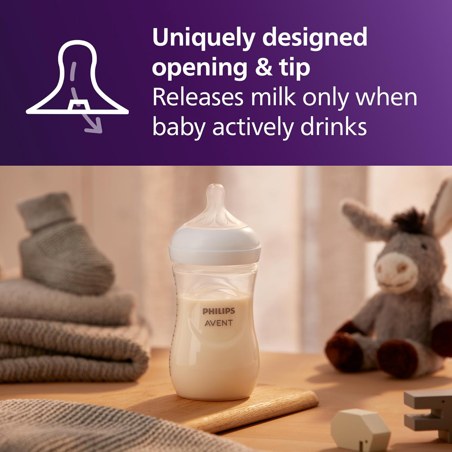 Highlights the bottle's specially designed opening and tip that only releases milk when the baby actively drinks, preventing spills and leaks.