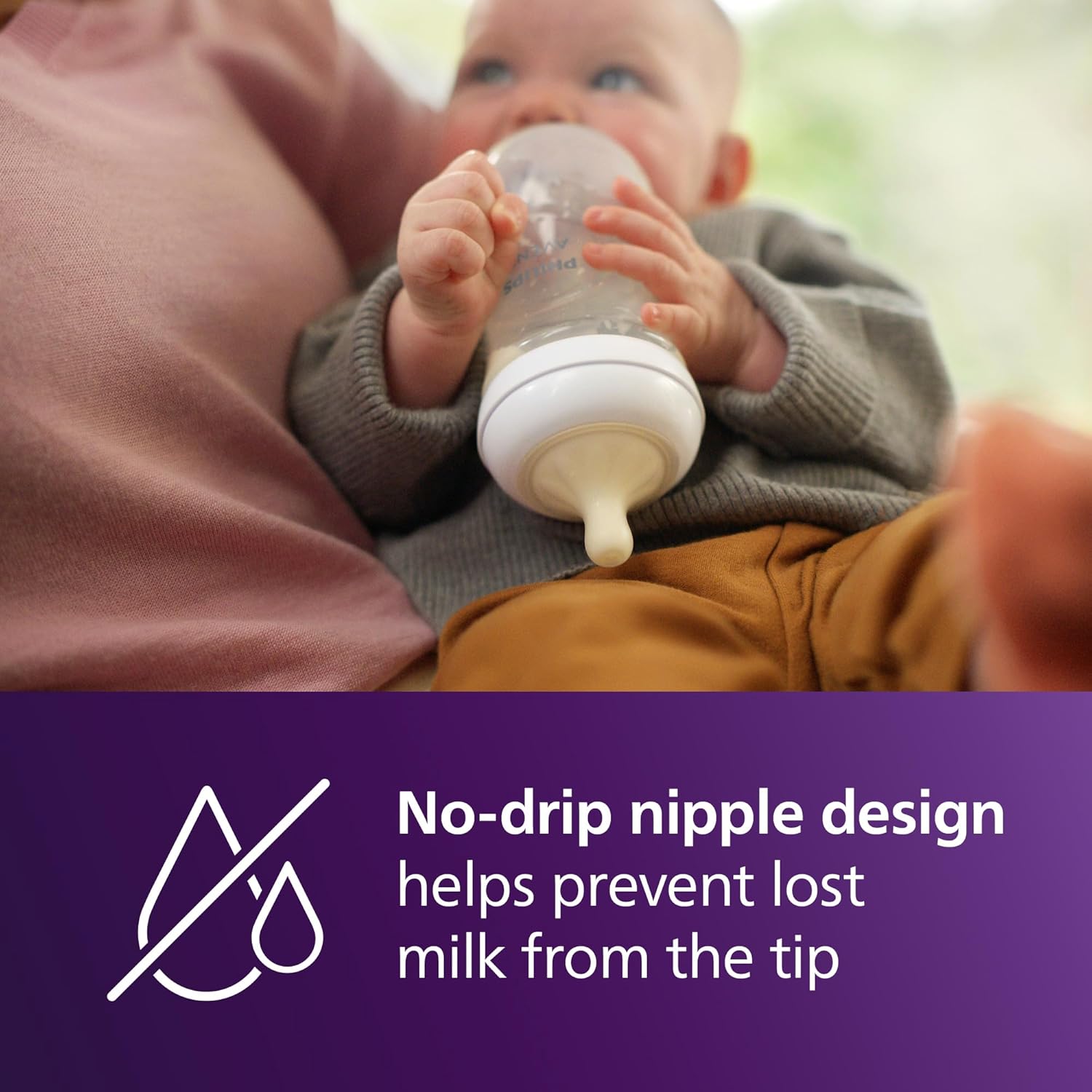 Highlights the bottle's no-drip nipple feature to reassure parents that milk won't be wasted and feeding will be mess-free.