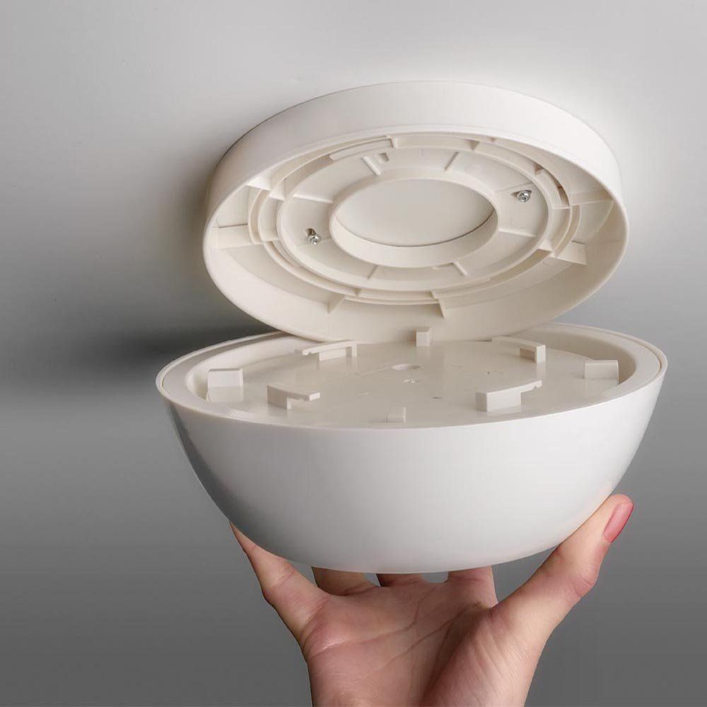 Shows the internal structure and components of the product, likely a smoke detector or similar device, to demonstrate its build quality and complexity.
