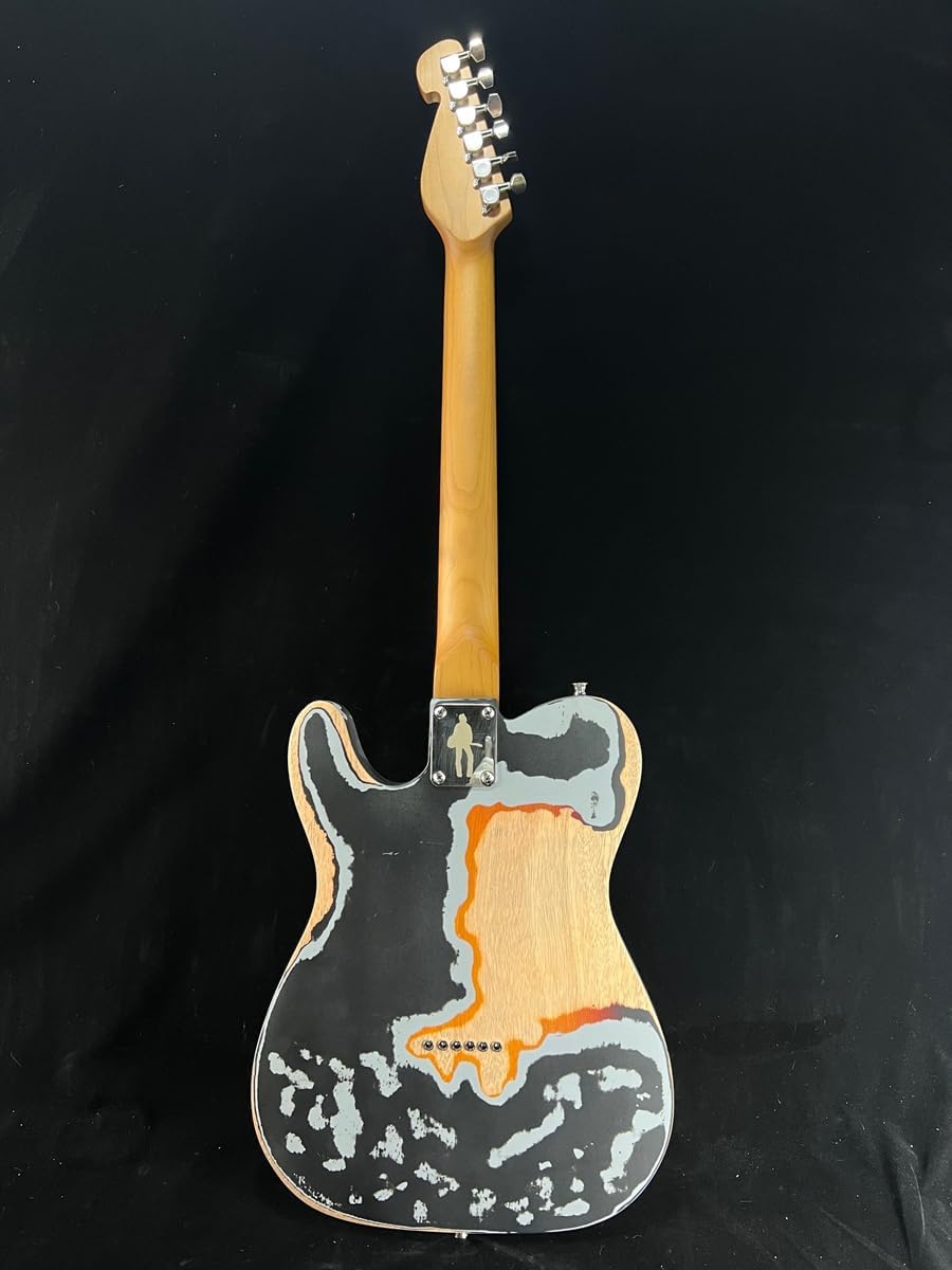 Showcases the guitar's distinctive aesthetic with a unique paint job or finish, highlighting its artistic and visual appeal to potential buyers.