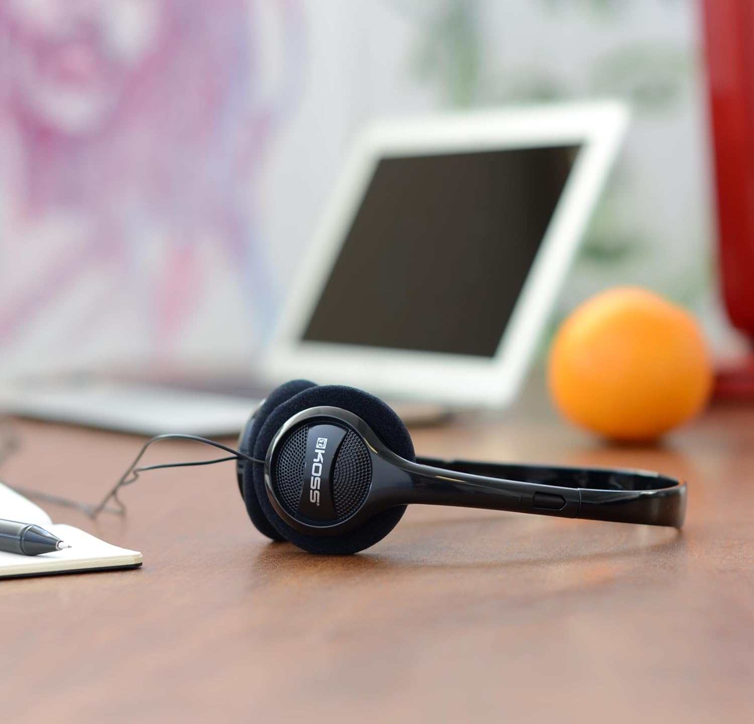 Shows the product's versatility for both work and study environments, highlighting its compatibility with various devices.