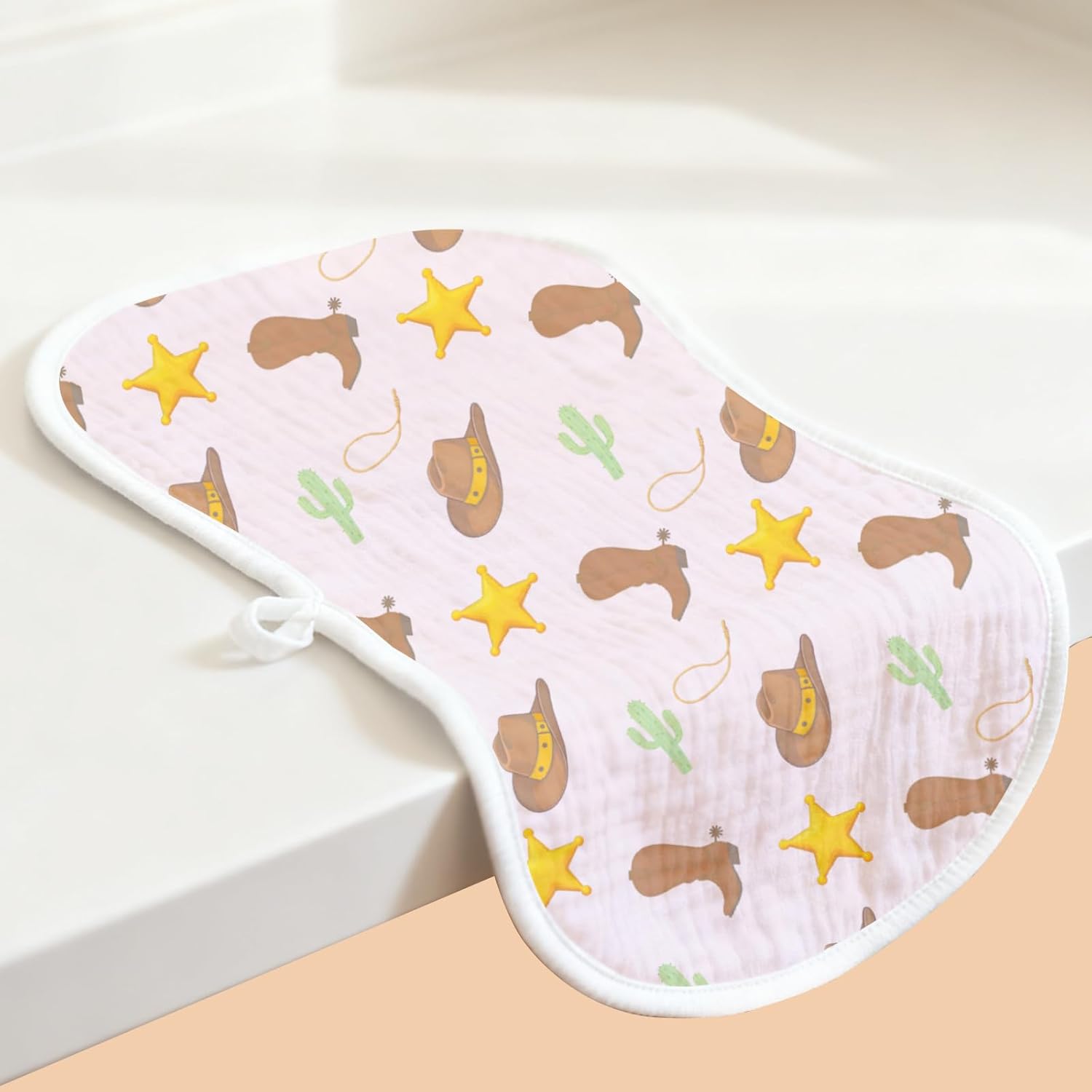 Showcases a baby product with a fun western/cowboy theme, appealing to parents looking for cute, themed baby items.