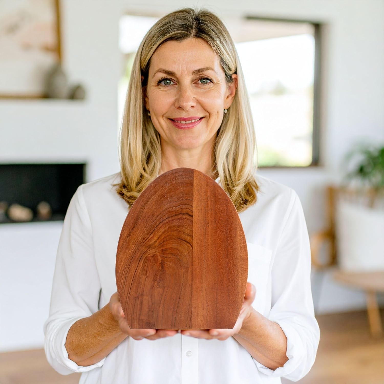 Shows the product in a real-world context, held by a smiling woman in a home setting to convey quality and customer satisfaction.