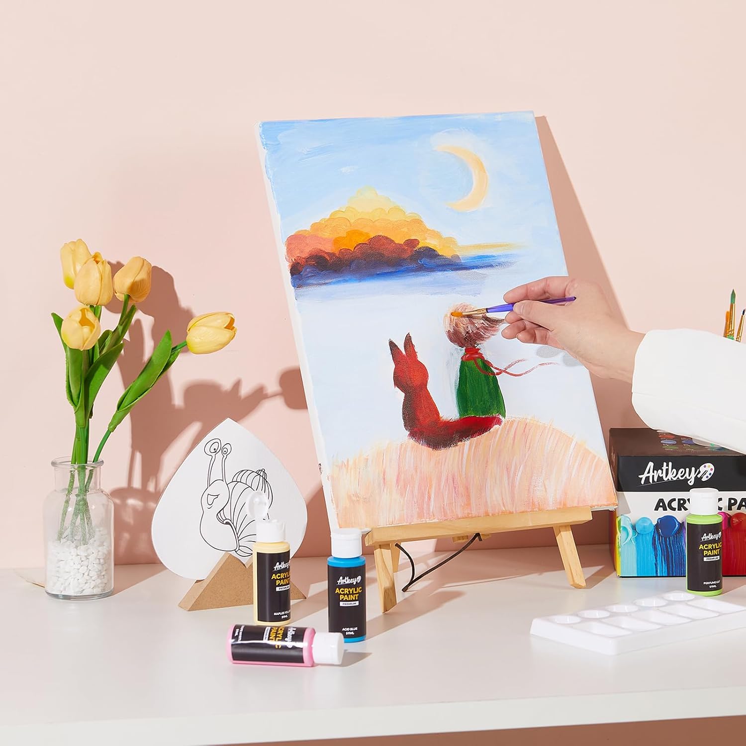 Shows the product being used in a real-world context, demonstrating how customers can enjoy painting as a hobby or creative activity.