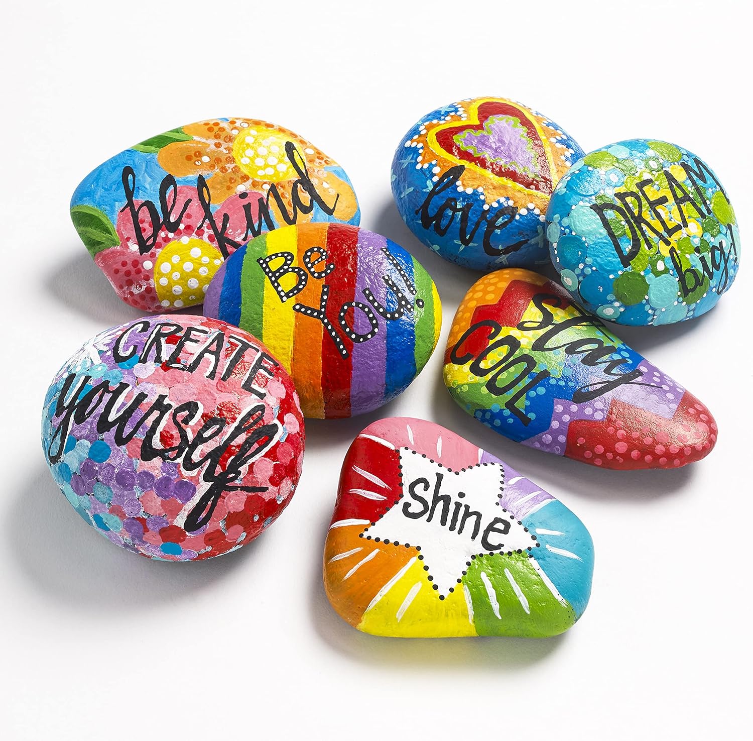 Showcases multiple painted rocks with uplifting messages and vibrant colors to inspire creativity and positivity.