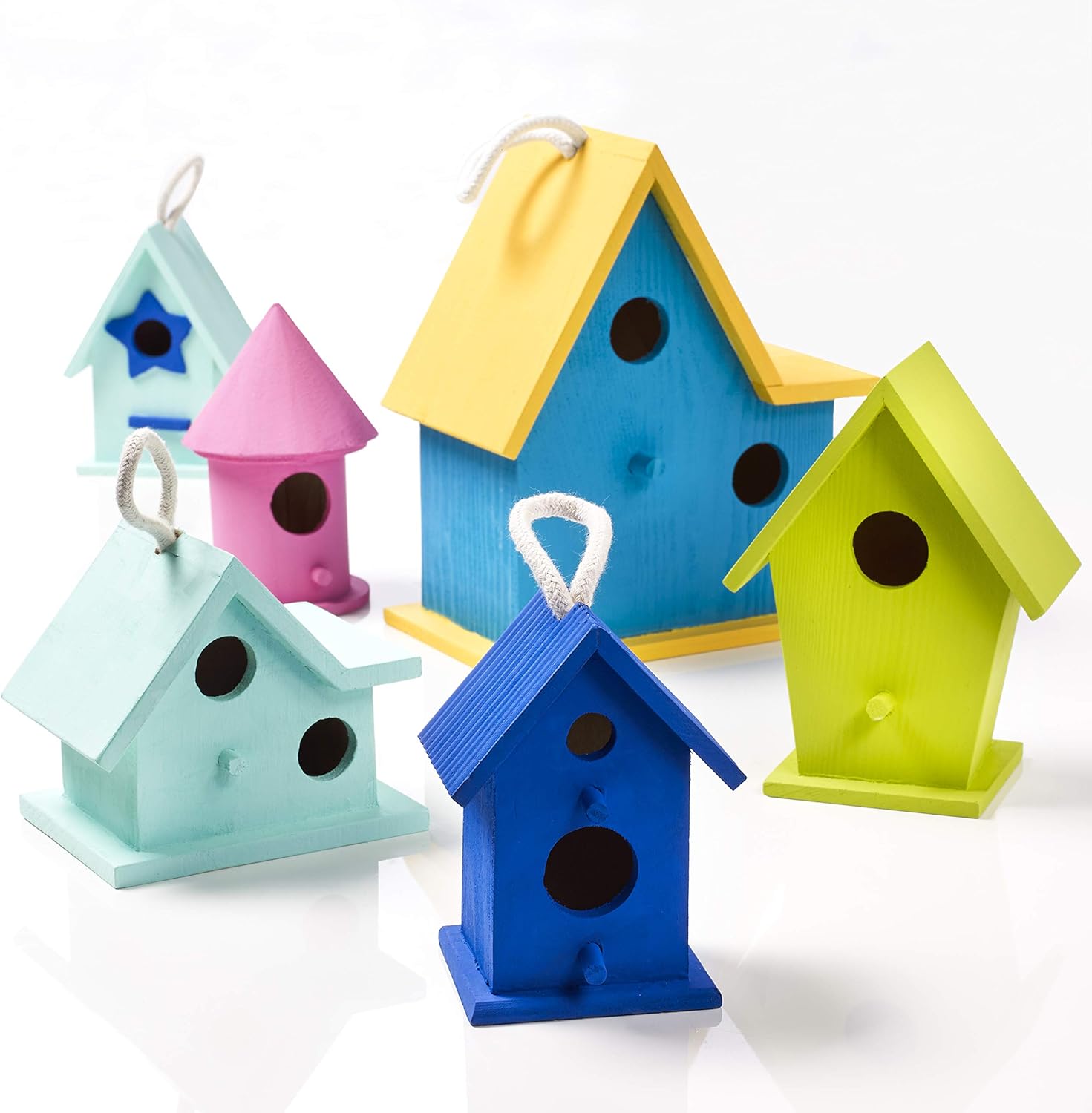 Shows the range of birdhouse designs included in the set, highlighting the variety of colors and shapes available.