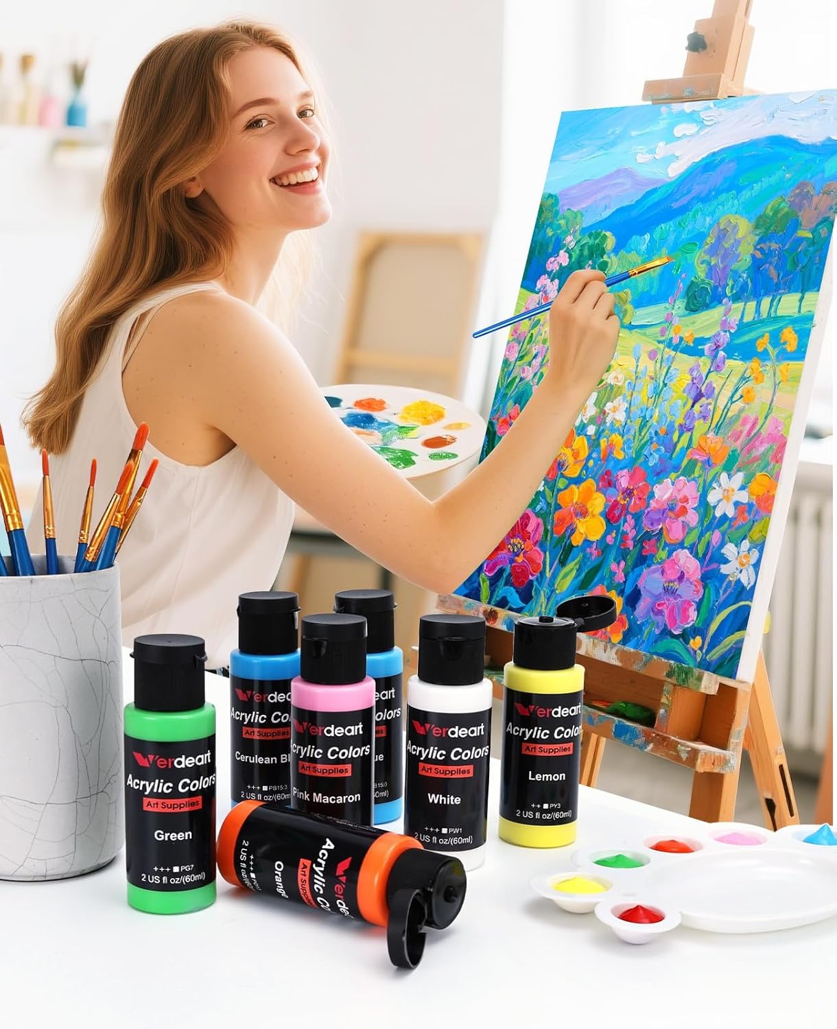 Shows the product being used in a real-life setting, demonstrating how the acrylic paints can be used to create vibrant artwork.