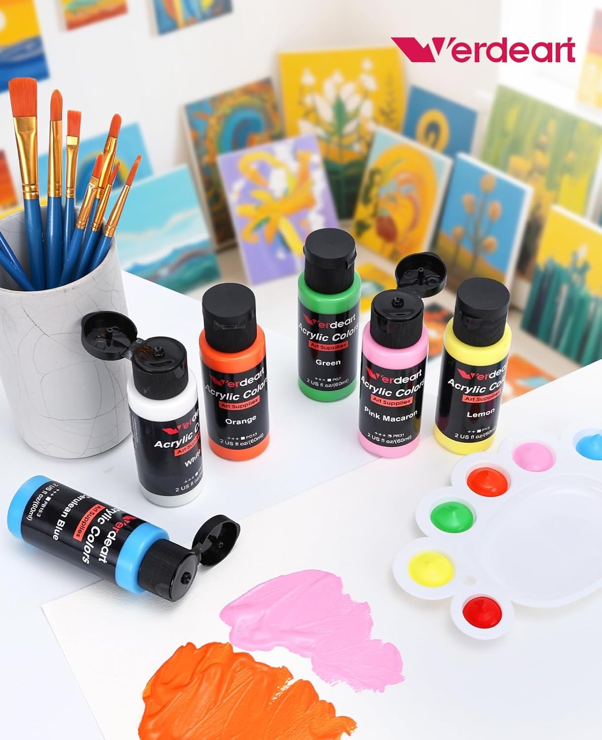Shows the complete set of acrylic paints, brushes, and accessories included in the Verdeart art supplies kit.