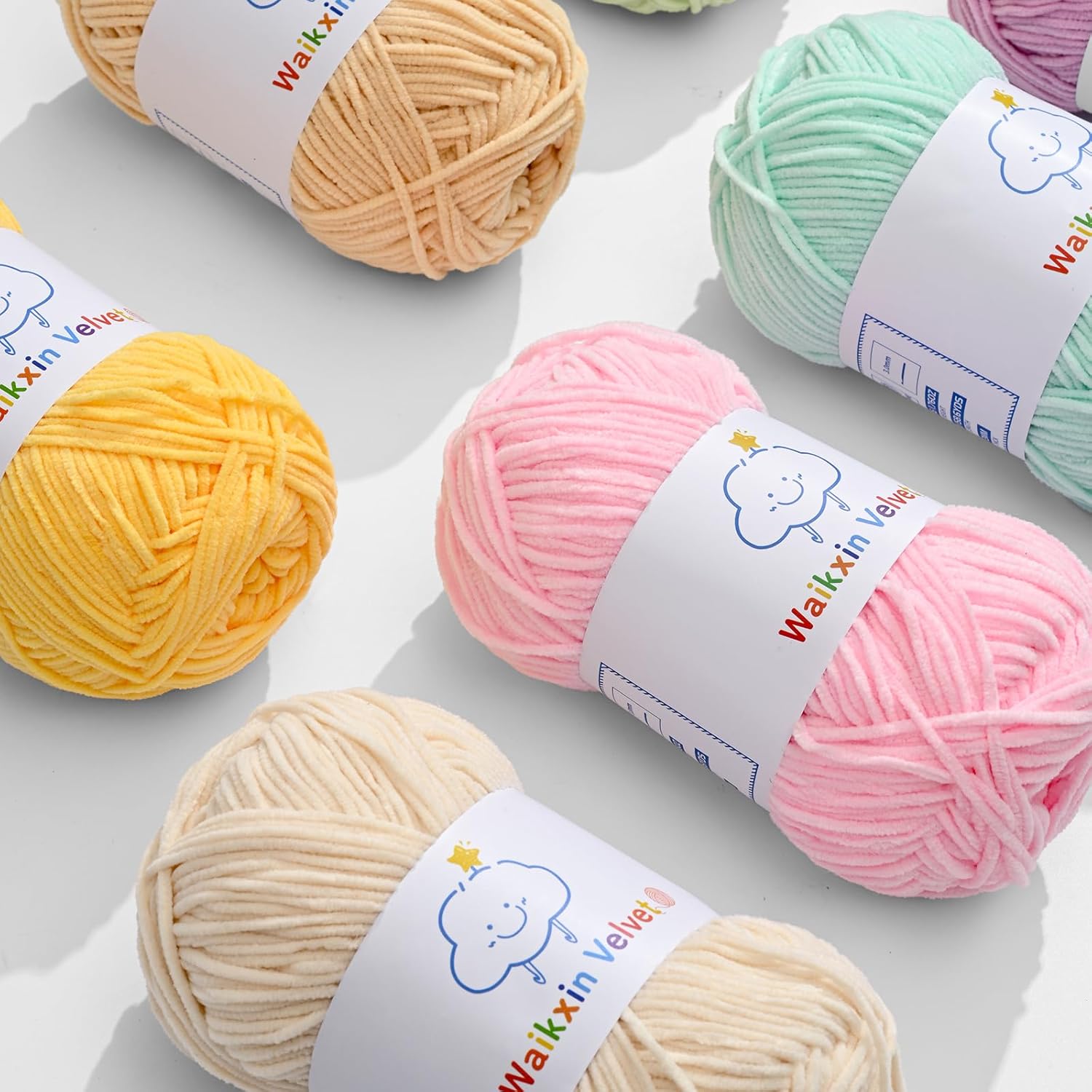 Showcases the range of pastel colors available in the yarn collection, appealing to crafters who want options for their projects.