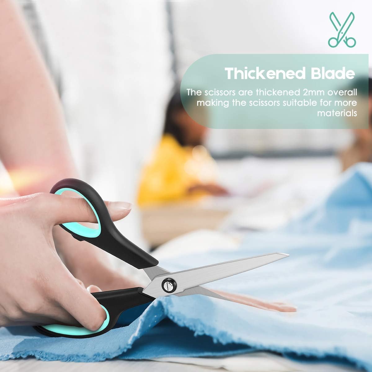 Highlights the scissors' thickened 2mm blade, emphasizing its versatility for cutting various materials.