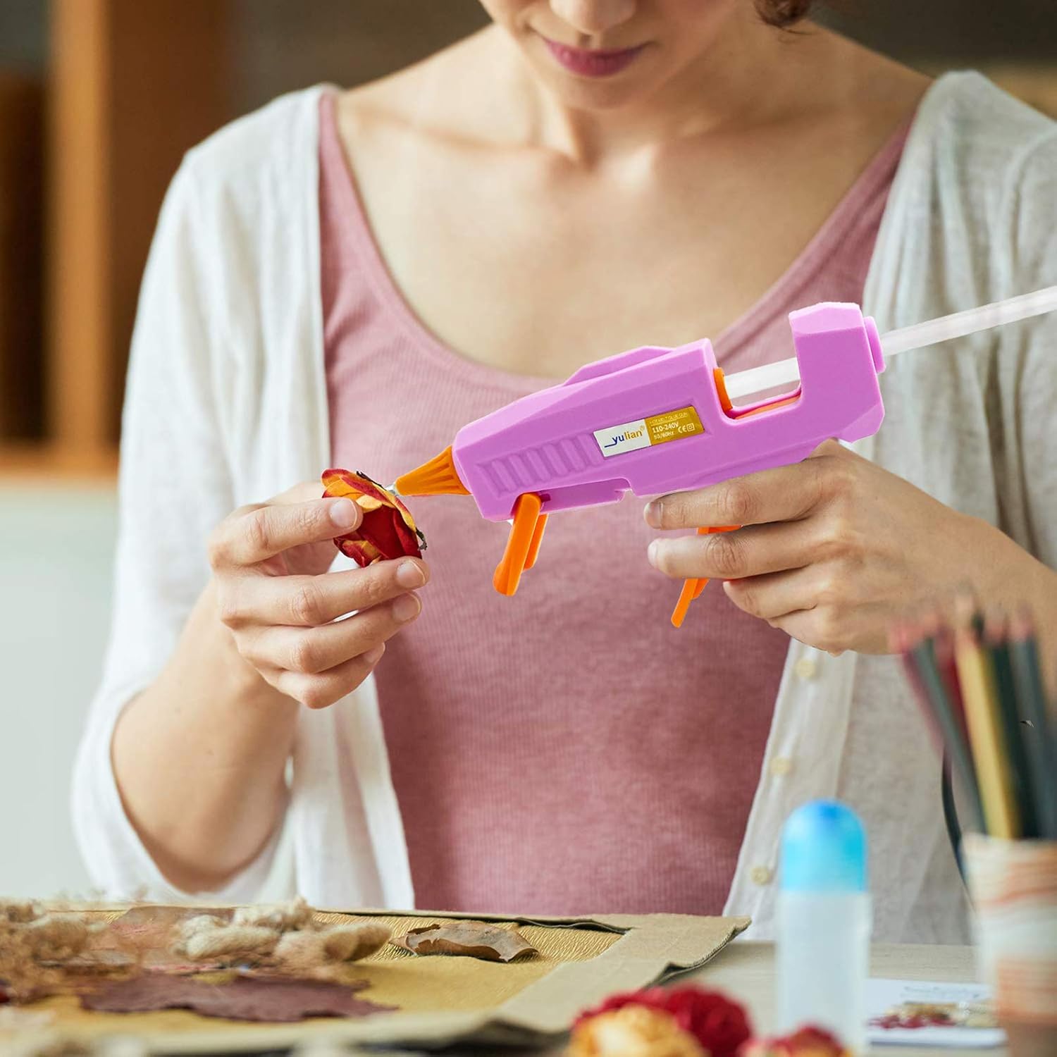 Shows the product being used in a real-world crafting scenario, demonstrating its practical application for DIY projects.