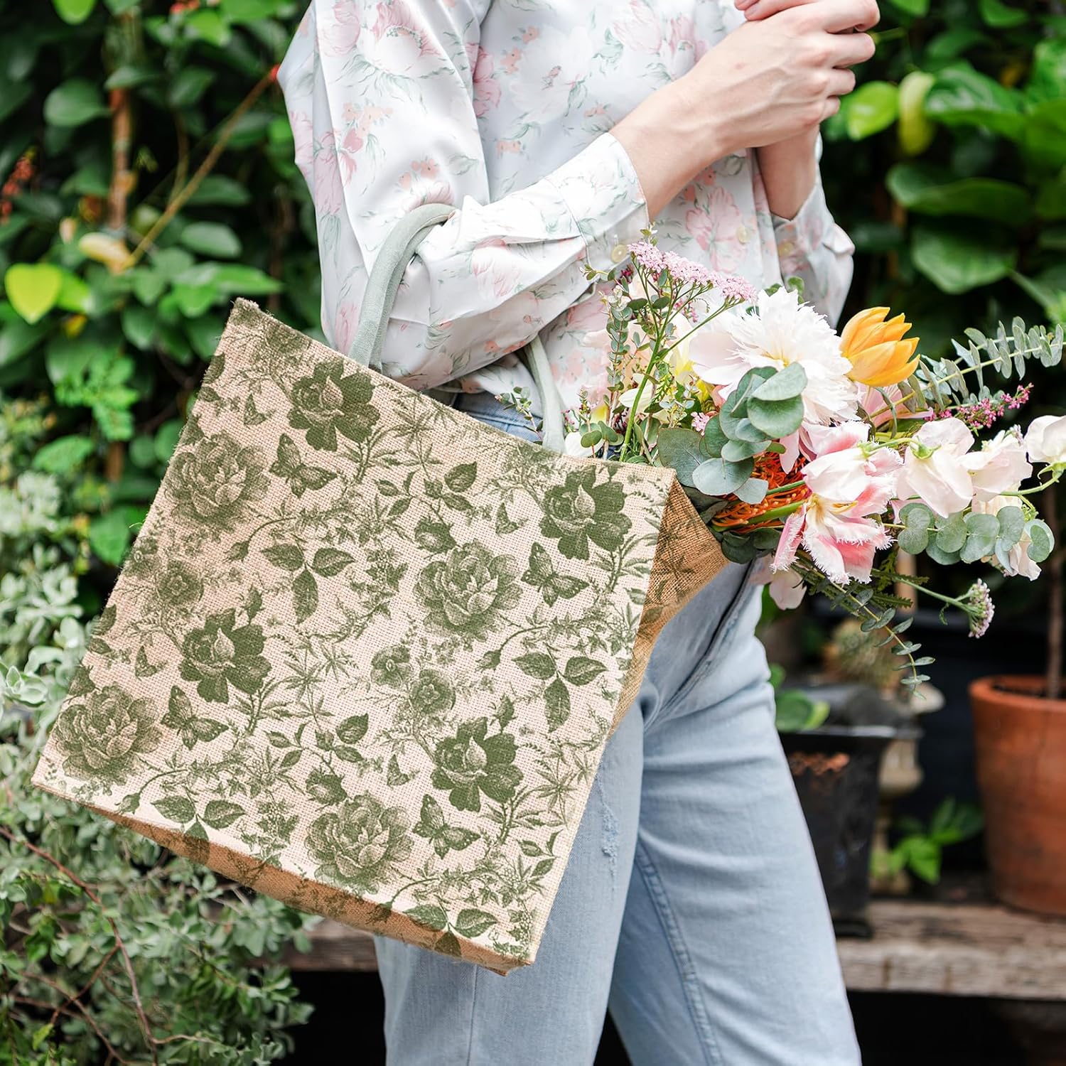 Shows the product in use in a natural garden setting, emphasizing its eco-friendly and stylish design for flower shopping or gardening activities.