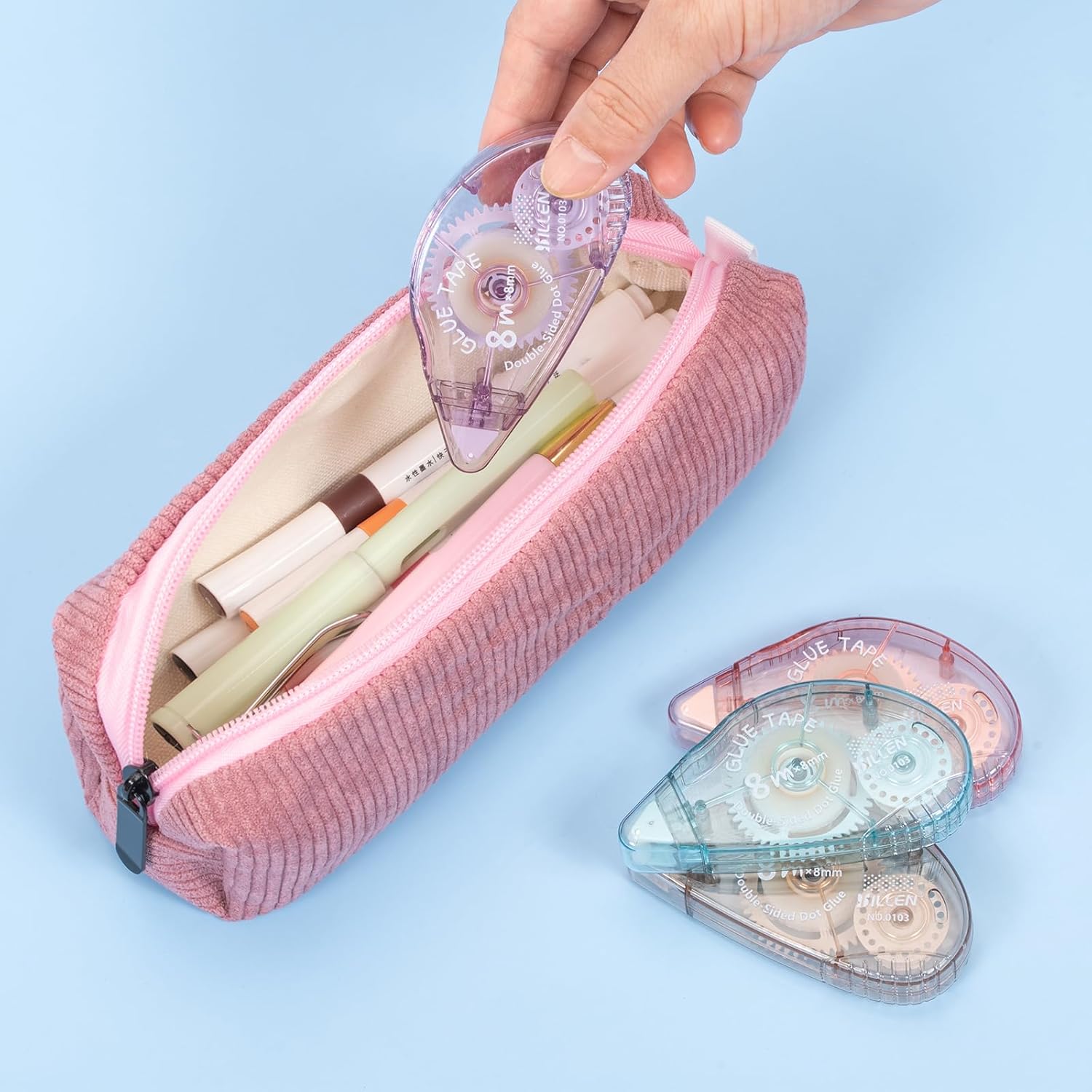 Shows the various items included in the pencil case, demonstrating its capacity and organization potential.