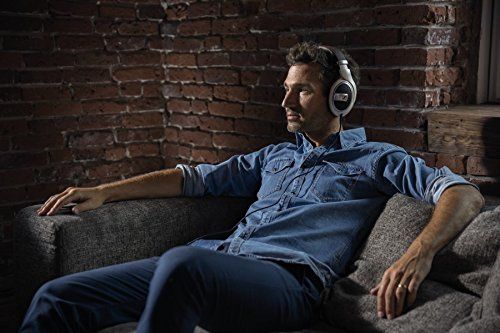 To demonstrate the comfortable and immersive use of the headphones in a home setting