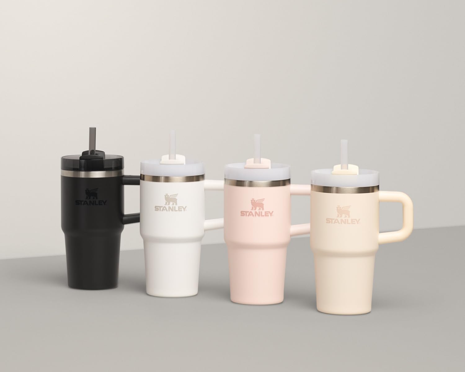 Showcases the different color options available for the Stanley travel mug, allowing customers to see the range of choices.