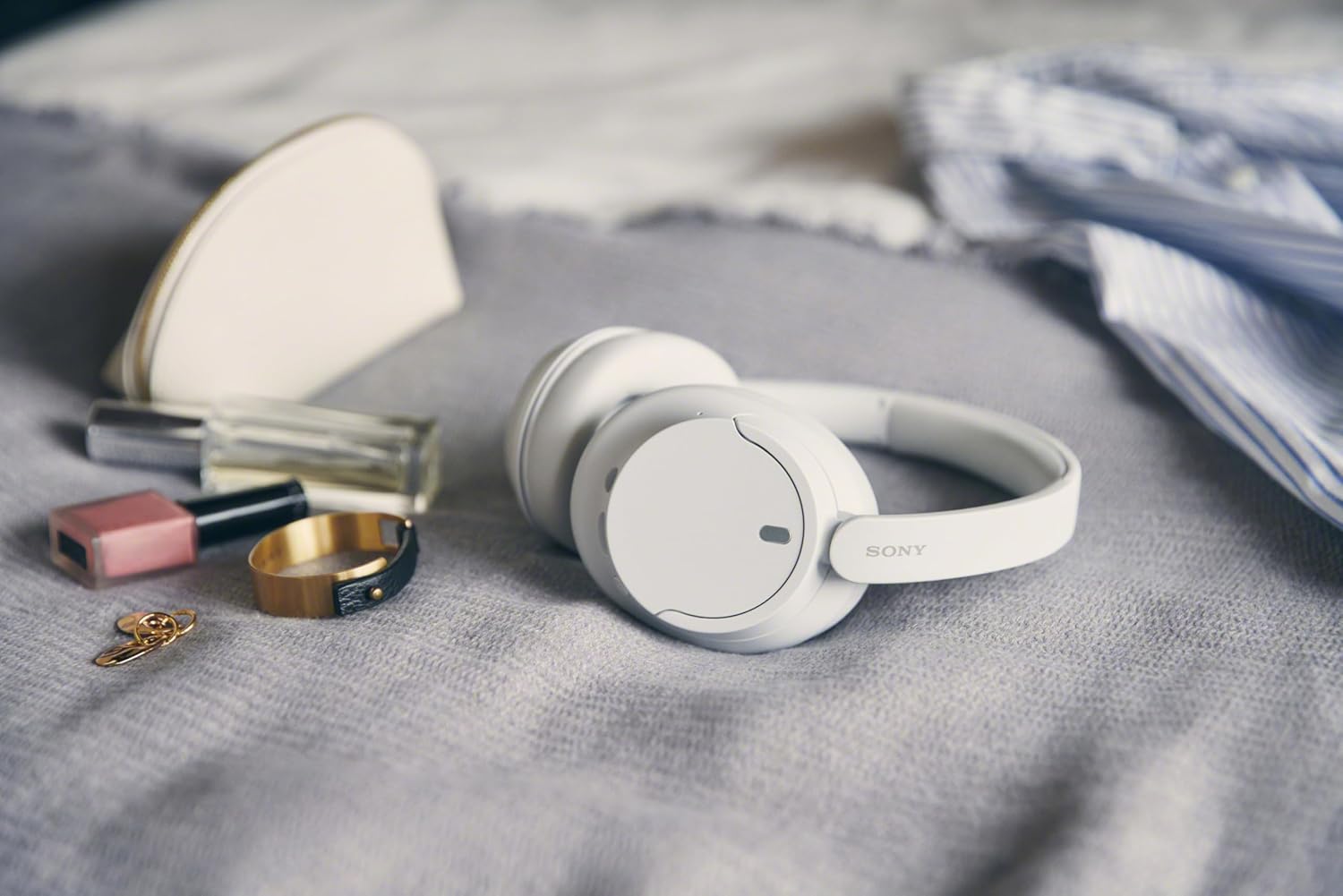 Shows the headphones in a real-world context to help shoppers visualize using them in their daily life.