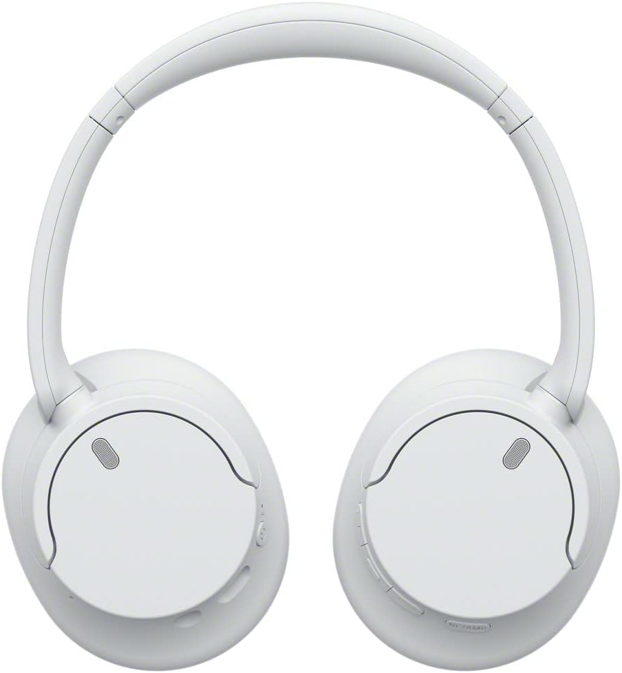 Shows the product in a clean, minimalist setting to highlight its sleek design and wireless functionality.