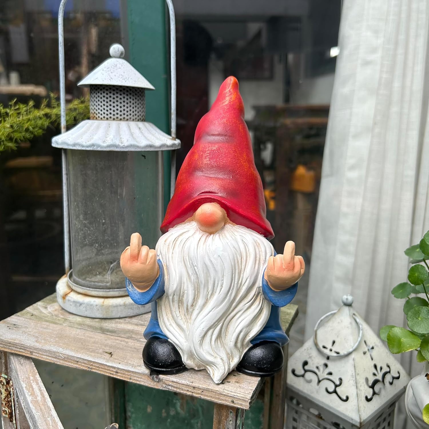 To showcase a quirky, attention-grabbing garden decoration that adds personality to outdoor spaces.