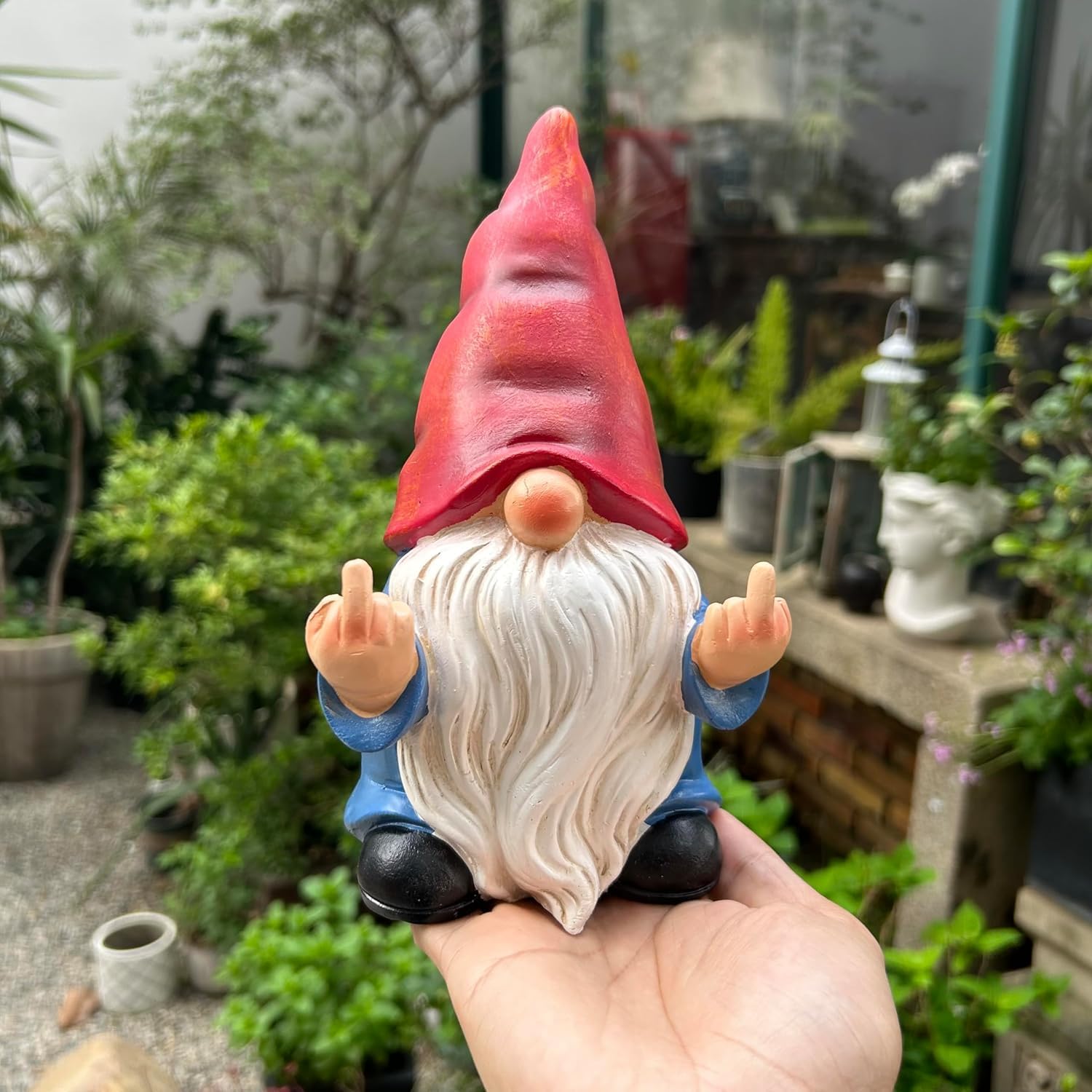 Shows the product in a real-world garden setting to demonstrate how it can be used as a decorative element.